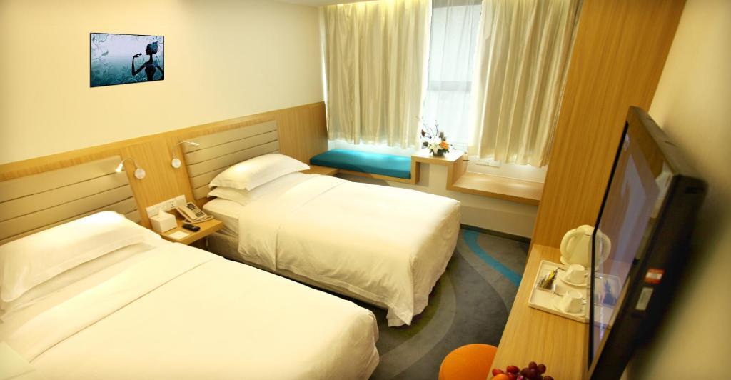 فندق شيانفي  Skytel Xi'An الغرفة الصورة